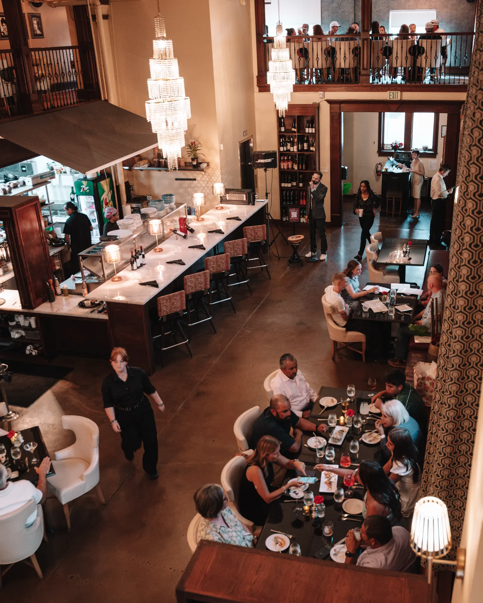 Guests dining at Eddy House during a live music night